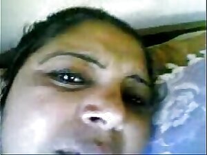 Indian aunty skillfully gives a blowjob, expertly using her tongue to pleasure her partner.